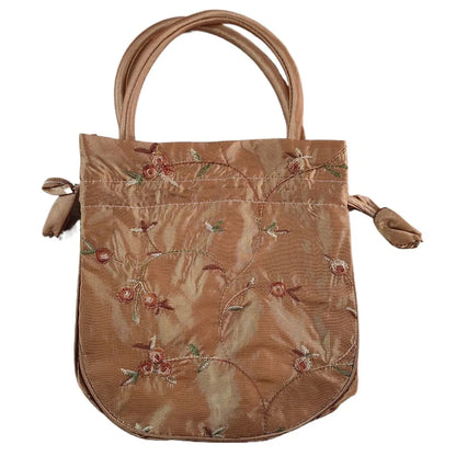 Sac à main bourse en satin avec broderies florales